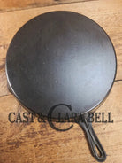 Awesome and tough to find! Scarce smooth bottom #12 Vollrath cast iron skillet. This is a conversation starter! Skillet
