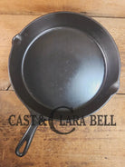 Awesome and tough to find! Scarce smooth bottom #12 Vollrath cast iron skillet. This is a conversation starter! Skillet
