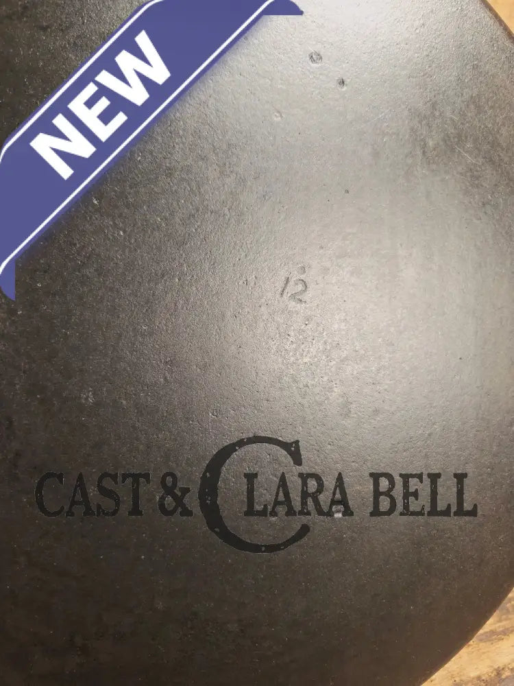 Awesome and tough to find! Scarce smooth bottom #12 Vollrath cast iron skillet. This is a conversation starter! Skillet