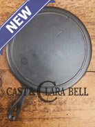 Classic 1910’s Lodge #7 Cast Iron Skillet Three Notch with raised T. Light sleek and ready to cook with! Skillet