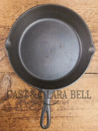 Classic 1910’s Lodge #7 Cast Iron Skillet Three Notch with raised T. Light sleek and ready to cook with! Skillet