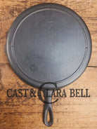 Classic 1910’s Lodge #7 Cast Iron Skillet Three Notch with raised T. Light sleek and ready to cook with! Skillet