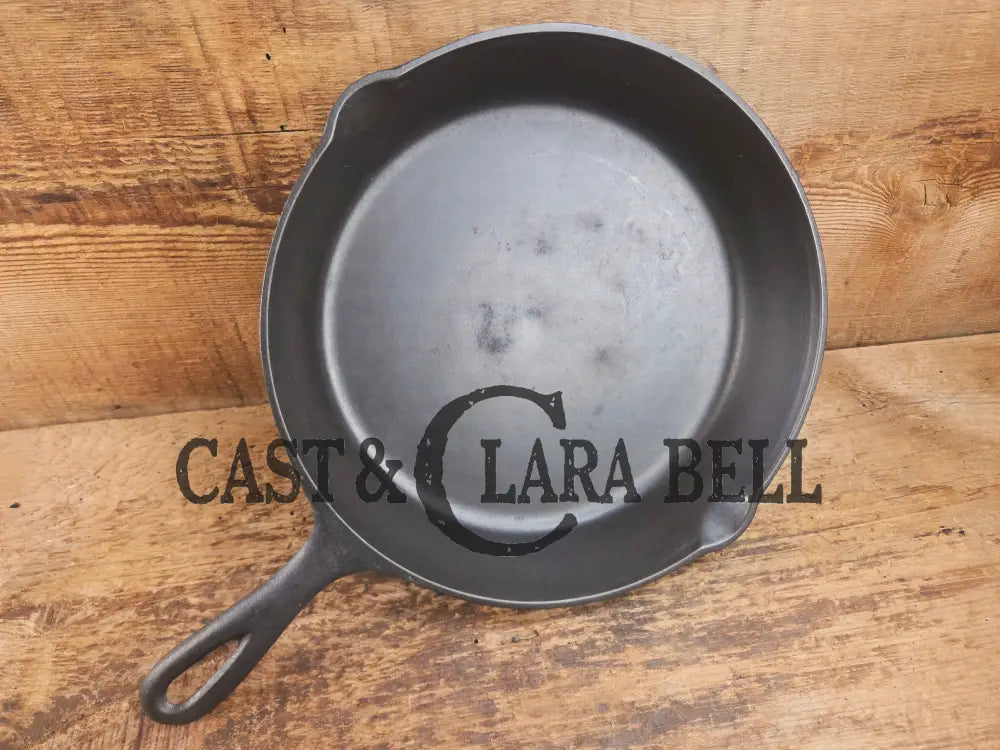 Classic 1910’s Lodge #7 Cast Iron Skillet Three Notch with raised T. Light sleek and ready to cook with! Skillet