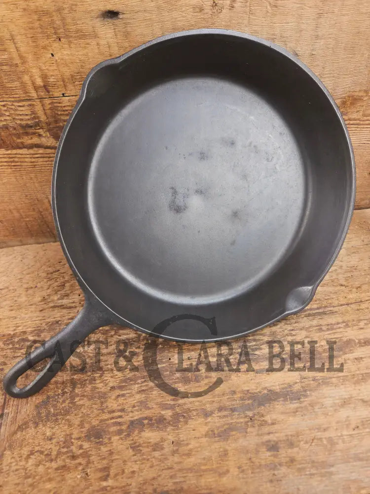 Classic 1910’s Lodge #7 Cast Iron Skillet Three Notch with raised T. Light sleek and ready to cook with! Skillet
