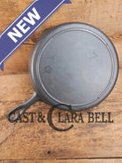 Classic 1910’s Lodge #7 Cast Iron Skillet Three Notch with raised T. Light sleek and ready to cook with! Skillet