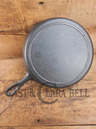 Classic 1910’s Lodge #7 Cast Iron Skillet Three Notch with raised T. Light sleek and ready to cook with! Skillet