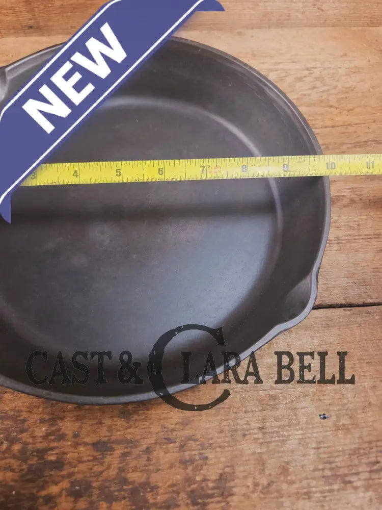 Classic 1910’s Lodge #7 Cast Iron Skillet Three Notch with raised T. Light sleek and ready to cook with! Skillet