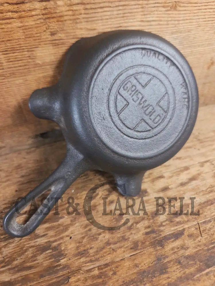 Collectible Griswold ’00’’ Ashtray / Spoon Rest No match holder. Small Novelty cast iron skillet for display or stove!