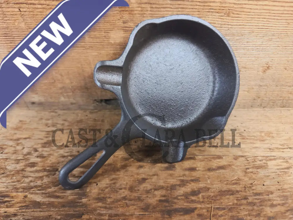 Collectible Griswold ’00’’ Ashtray / Spoon Rest No match holder. Small Novelty cast iron skillet for display or stove!