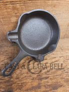 Collectible Griswold ’00’’ Ashtray / Spoon Rest No match holder. Small Novelty cast iron skillet for display or stove!