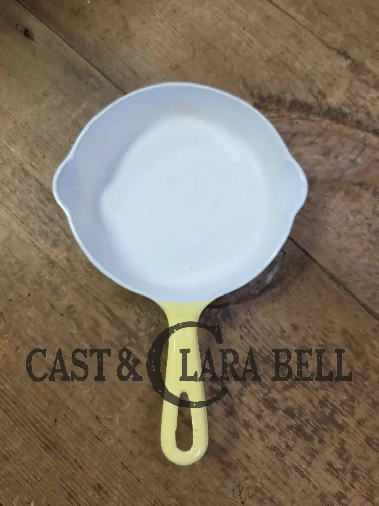 Cool and not often seen! 1940’s Griswold No. 3 ’Yellow and Cream’ enameled Cast Iron Egg Skillet 709