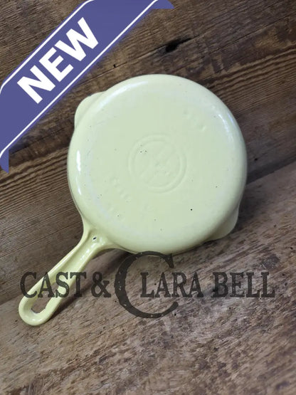 Cool and not often seen! 1940’s Griswold No. 3 ’Yellow and Cream’ enameled Cast Iron Egg Skillet 709