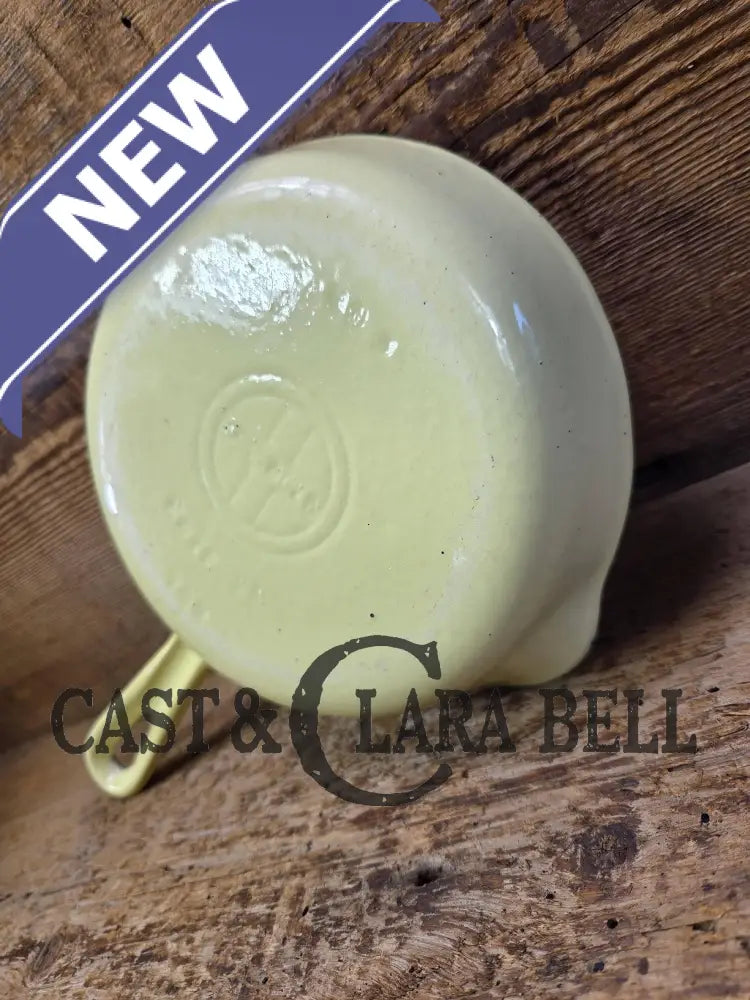 Cool and not often seen! 1940’s Griswold No. 3 ’Yellow and Cream’ enameled Cast Iron Egg Skillet 709
