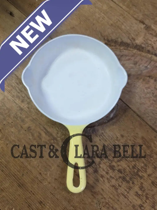 Cool and not often seen! 1940’s Griswold No. 3 ’Yellow and Cream’ enameled Cast Iron Egg Skillet 709
