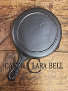 Cool! Mid 1900’s tougher to find Lodge Vintage #4 skillet with two dot maker mark. Skillet