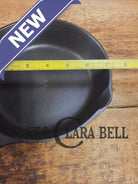 Cool! Mid 1900’s tougher to find Lodge Vintage #4 skillet with two dot maker mark. Skillet