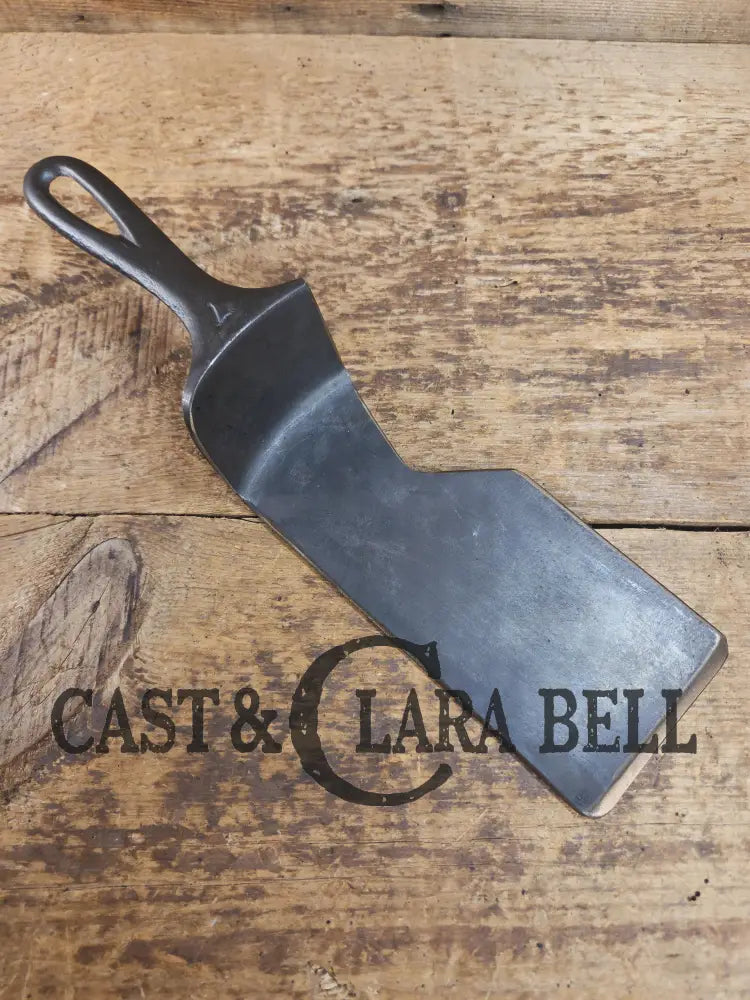 Custom and Funky! Cast Iron Spatula made from a cracked Griswold Large Block 7 Skillet. Funky crack was cut away