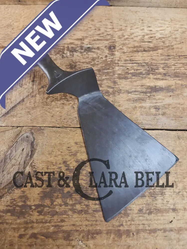 Custom and Funky! Cast Iron Spatula made from a cracked Griswold Large Block 7 Skillet. Funky crack was cut away