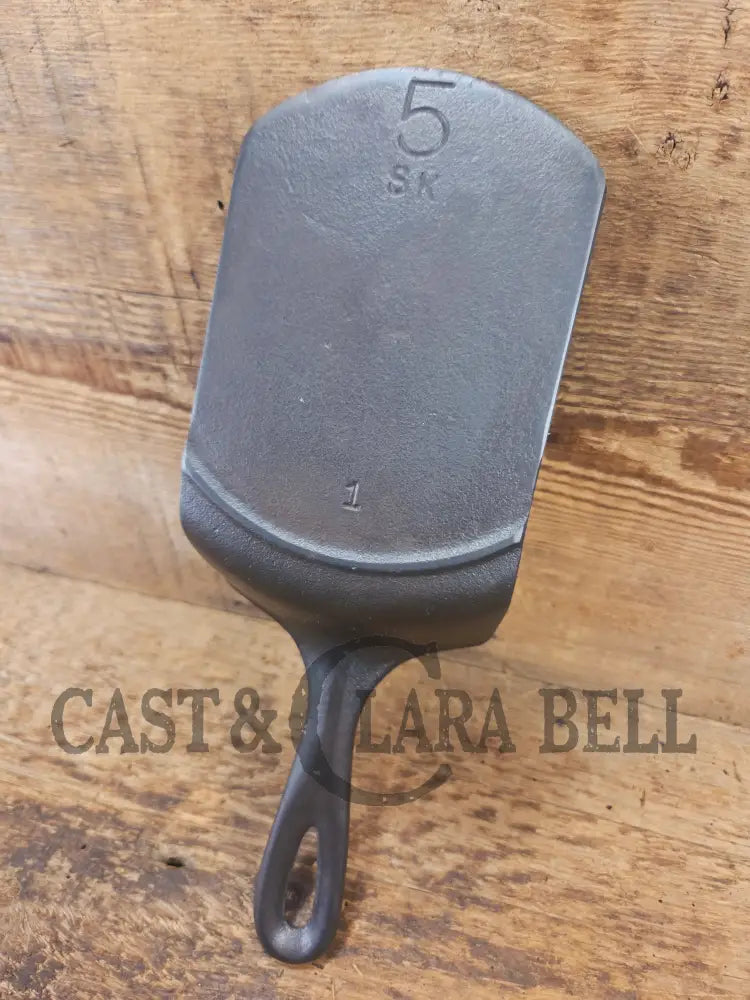 Custom made #5 Lodge Cast Iron Skillet Spatula. Reclaimed from a early to mid 1900’s three notch Lodge skillet. Great