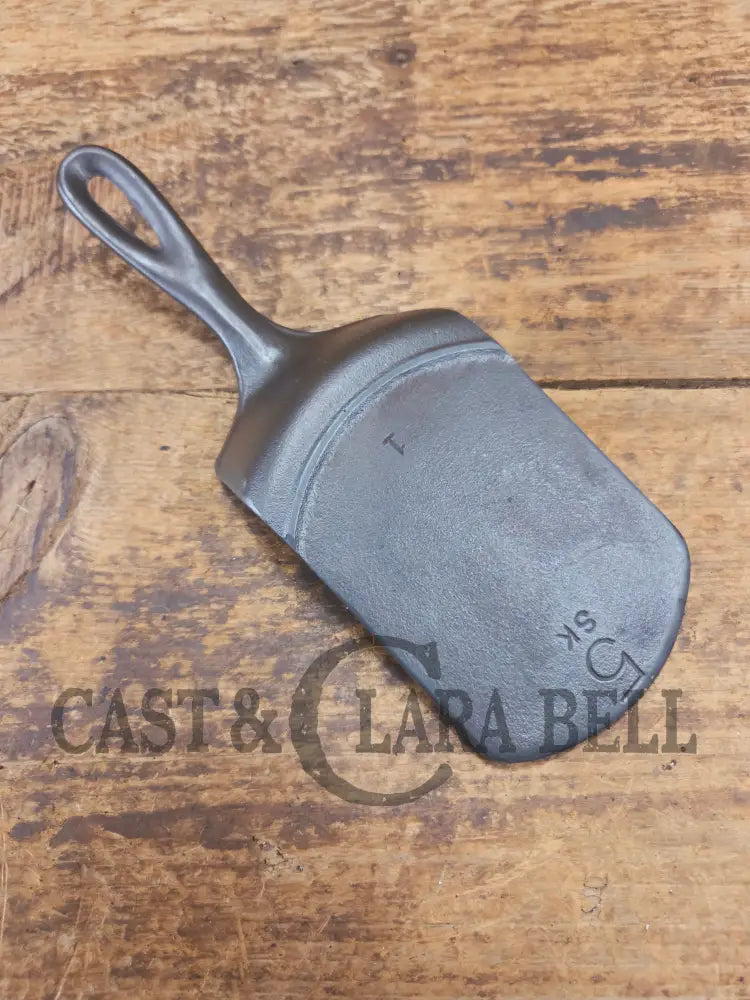 Custom made #5 Lodge Cast Iron Skillet Spatula. Reclaimed from a early to mid 1900’s three notch Lodge skillet. Great