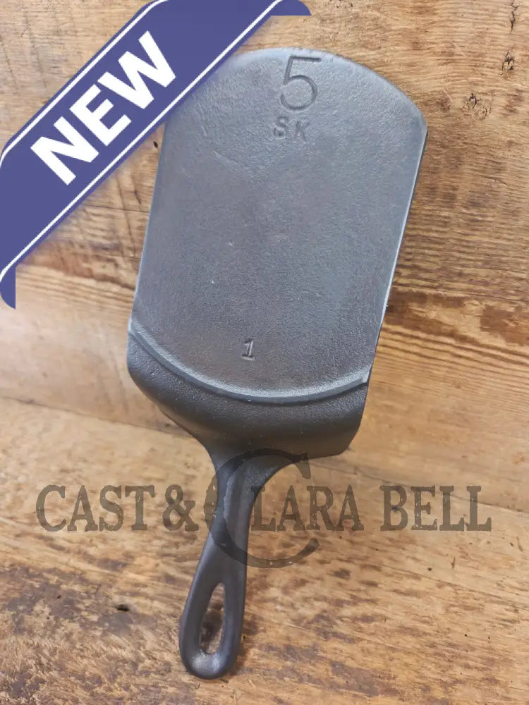 Custom made #5 Lodge Cast Iron Skillet Spatula. Reclaimed from a early to mid 1900’s three notch Lodge skillet. Great