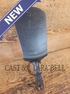 Custom made #5 Lodge Cast Iron Skillet Spatula w RAISED B. Reclaimed from a early to mid 1900’s single notch Lodge