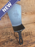 Custom made #5 Lodge Cast Iron Skillet Spatula w RAISED B. Reclaimed from a early to mid 1900’s single notch Lodge