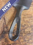 Custom made #5 Lodge Cast Iron Skillet Spatula w RAISED B. Reclaimed from a early to mid 1900’s single notch Lodge
