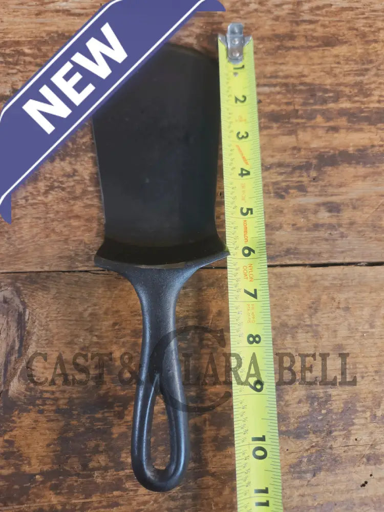 Custom made #5 Lodge Cast Iron Skillet Spatula w RAISED B. Reclaimed from a early to mid 1900’s single notch Lodge