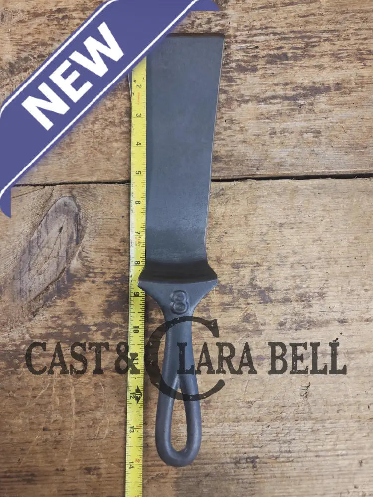 Custom made from a Raised #8 Lodge Arc Logo Cast Iron Skillet Spatula. A collectors’ prize to own repurposed for a
