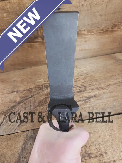 Custom made from a Raised #8 Lodge Arc Logo Cast Iron Skillet Spatula. A collectors’ prize to own repurposed for a