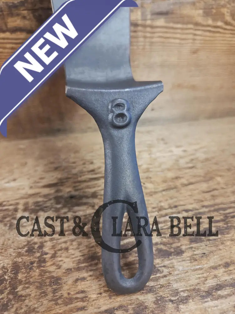Custom made from a Raised #8 Lodge Arc Logo Cast Iron Skillet Spatula. A collectors’ prize to own repurposed for a