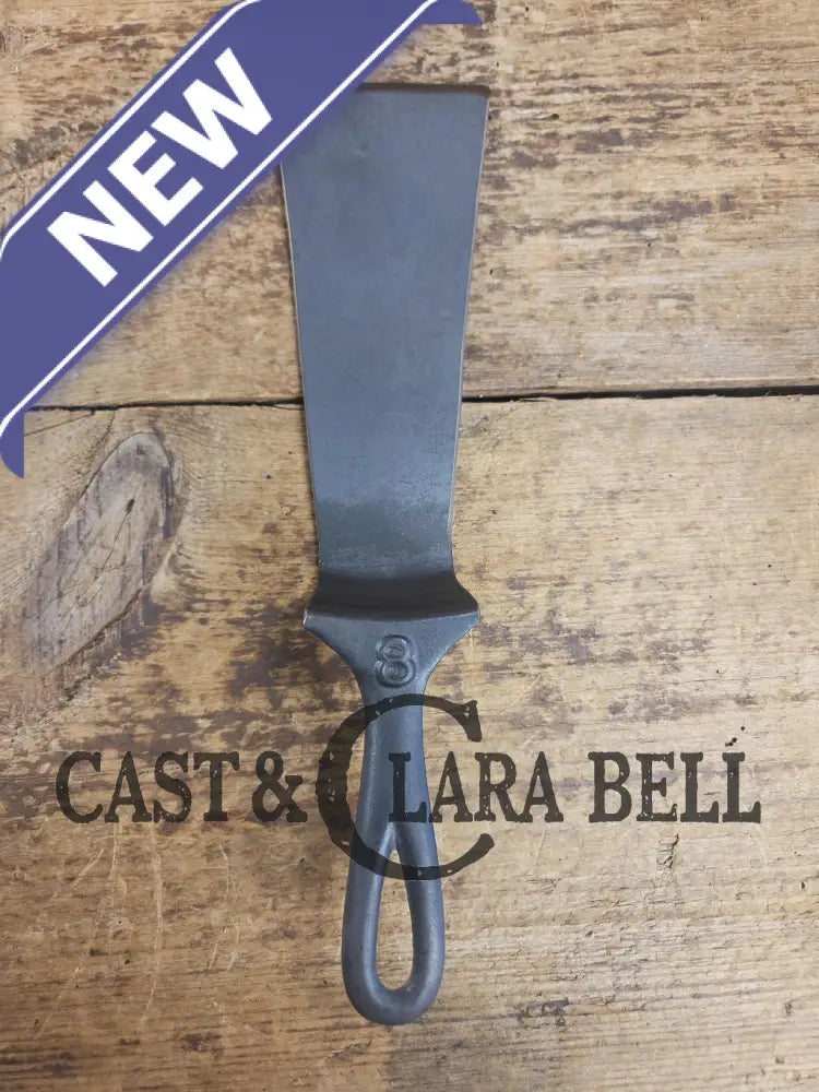 Custom made from a Raised #8 Lodge Arc Logo Cast Iron Skillet Spatula. A collectors’ prize to own repurposed for a