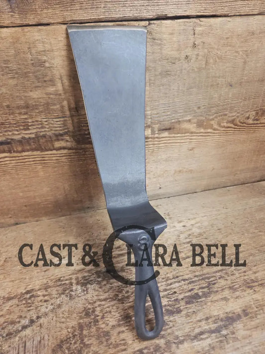 Custom made from a Raised #8 Lodge Arc Logo Cast Iron Skillet Spatula. A collectors’ prize to own repurposed for a