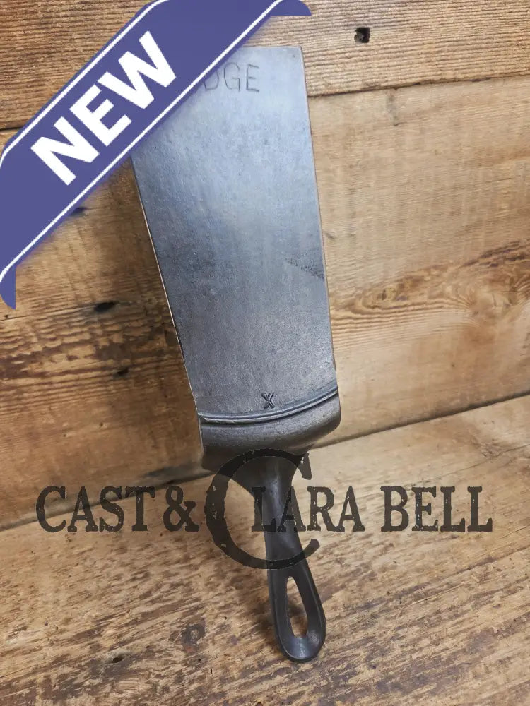 Custom made from a Raised #8 Lodge Arc Logo Cast Iron Skillet Spatula. A collectors’ prize to own repurposed for a