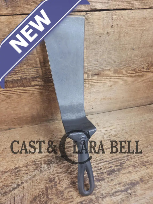 Custom made from a Raised #8 Lodge Arc Logo Cast Iron Skillet Spatula. A collectors’ prize to own repurposed for a