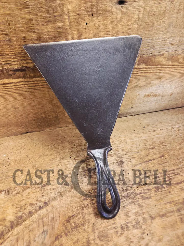 Custom made one of a kind 1800’s #8 Cast Iron Griddle Repurposed into triangular grill spatula. Perfect for the Home