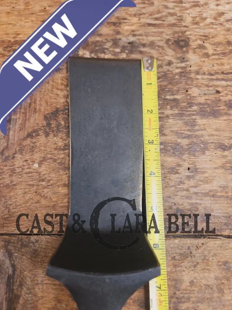 Custom made one of a kind 1940’s Era Lodge repurposed spatula. Turned an ordinary cracked skillet into a grill helper!