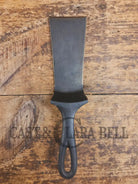 Custom made one of a kind 1940’s Era Lodge repurposed spatula. Turned an ordinary cracked skillet into a grill helper!