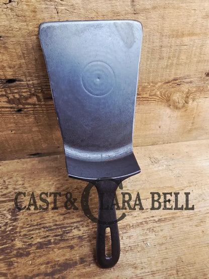 Custom made one of a kind #8 Cast Iron spatula. Made from Repurposed cast iron skillet. Awesome gift or a handy tool in