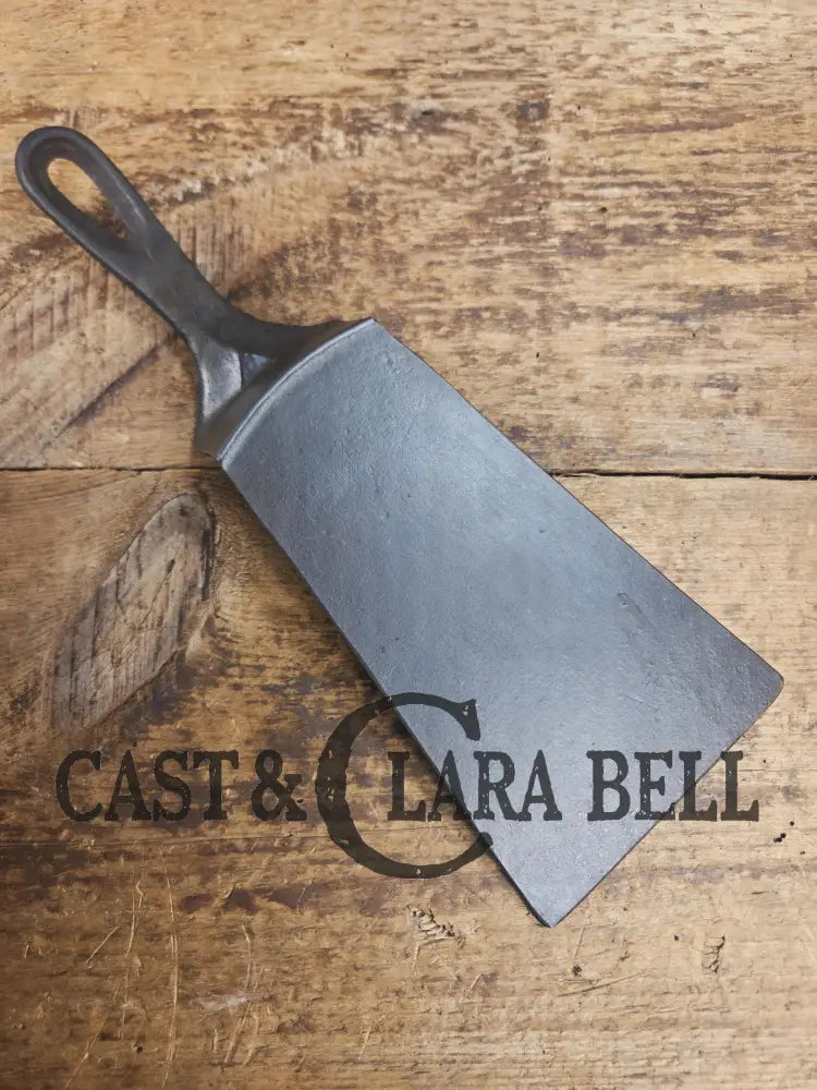 Custom made one of a kind Cast Iron Spatula. Maker unknown likely Wagner but a wonderful gift for the griller in your