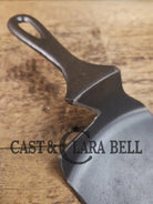 Custom made one of a kind early #7 1900’s Lodge no notch repurposed spatula. Turned an ordinary cracked skillet into a