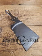 Custom made one of a kind early #7 1900’s Lodge no notch repurposed spatula. Turned an ordinary cracked skillet into a