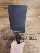 Custom made one of a kind early #7 1900’s Lodge no notch repurposed spatula. Turned an ordinary cracked skillet into a