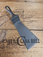 Custom made one of a kind early #9 1900’s Lodge repurposed spatula. Turned an ordinary cracked skillet into a grill