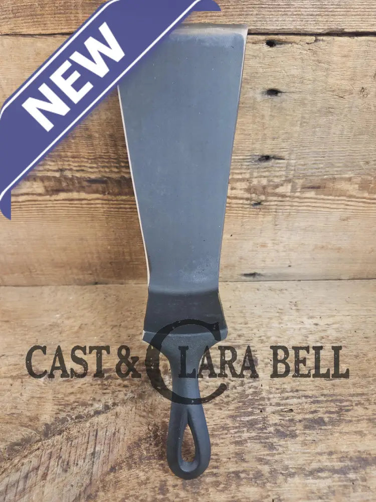 Custom made one of a kind early #9 1900’s Lodge repurposed spatula. Turned an ordinary cracked skillet into a grill