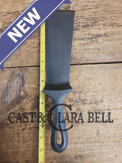 Custom made one of a kind early #9 1900’s Lodge repurposed spatula. Turned an ordinary cracked skillet into a grill