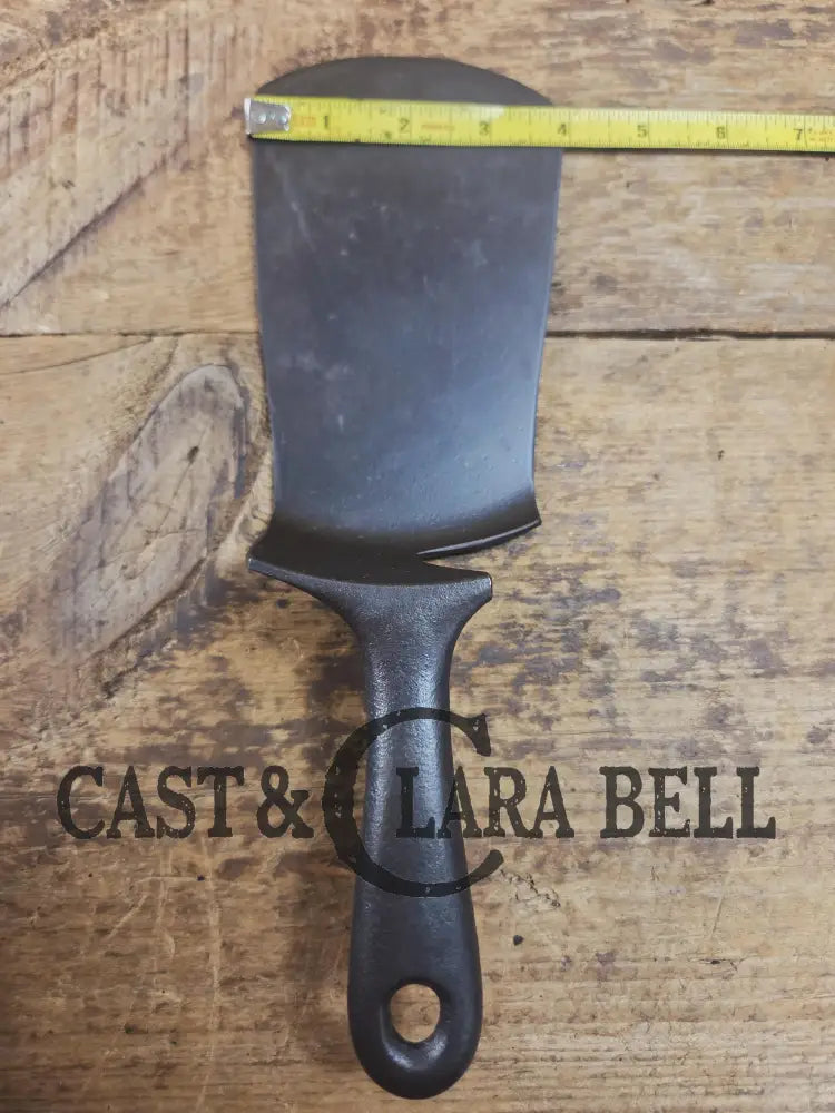 Custom made one of a kind Griswold Good Health #5 repurposed spatula. Turned an ordinary cracked skillet into an