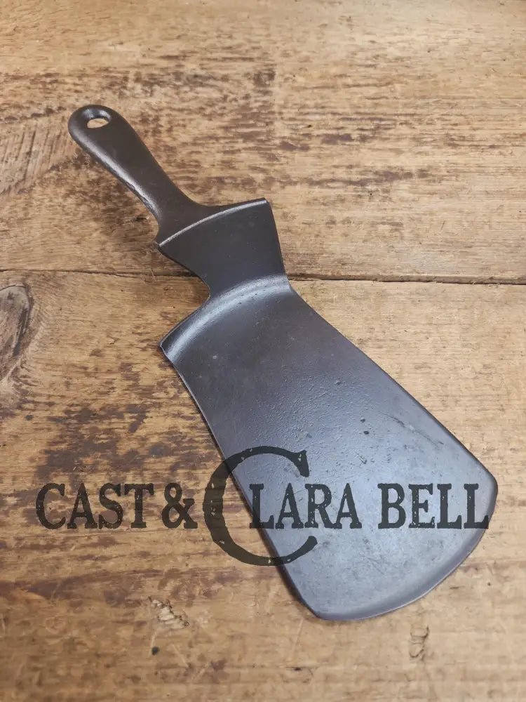 Custom made one of a kind Griswold Good Health #5 repurposed spatula. Turned an ordinary cracked skillet into an