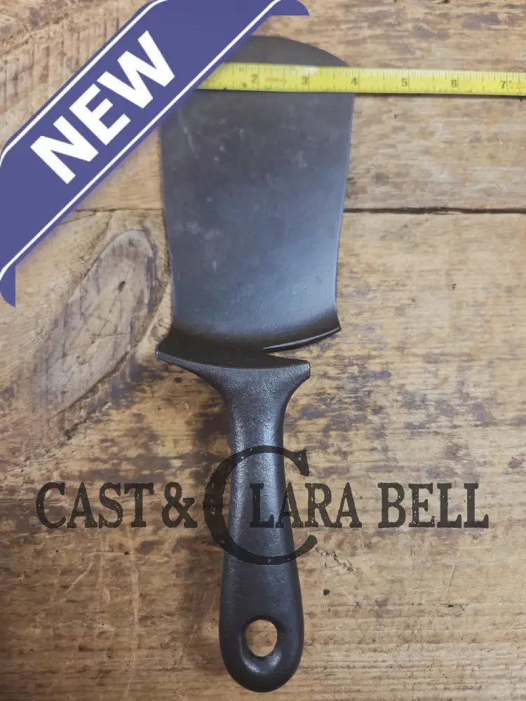 Custom made one of a kind Griswold Good Health #5 repurposed spatula. Turned an ordinary cracked skillet into an